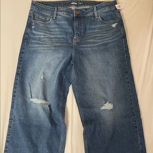 NWT distressed high rise, slim cut wide leg jeans. Medium rinse denim.